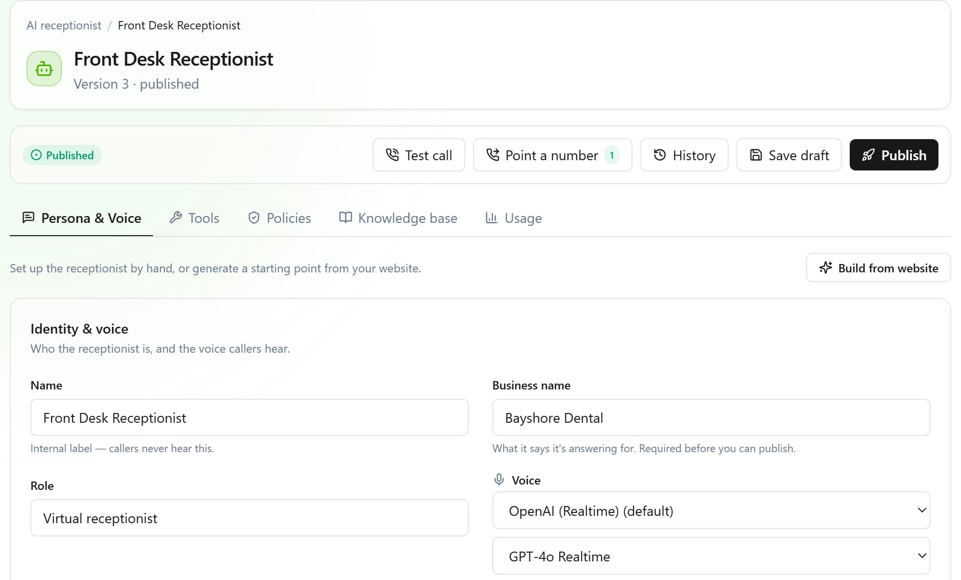 Setting up the AI receptionist: a published front desk receptionist with test call, point a number, history and publish controls, and its name, business and voice.